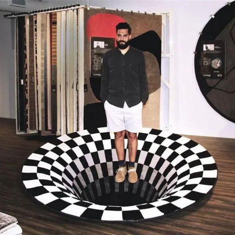 Half-price discount on mesmerizing Vortex Illusion Rug.