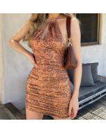 A sexy backless vintage print dress with a hollowed-out chest