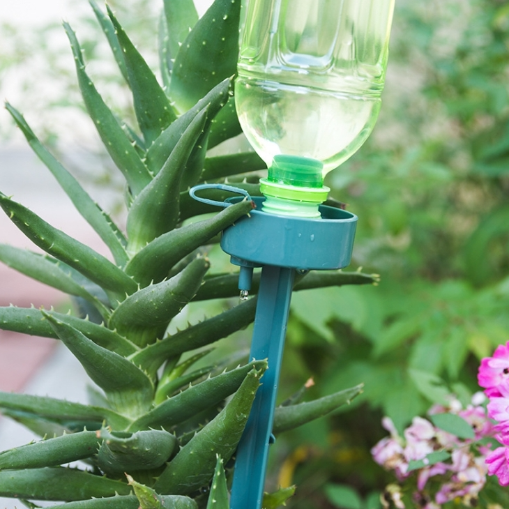 Automatic flower watering device with switch control valve