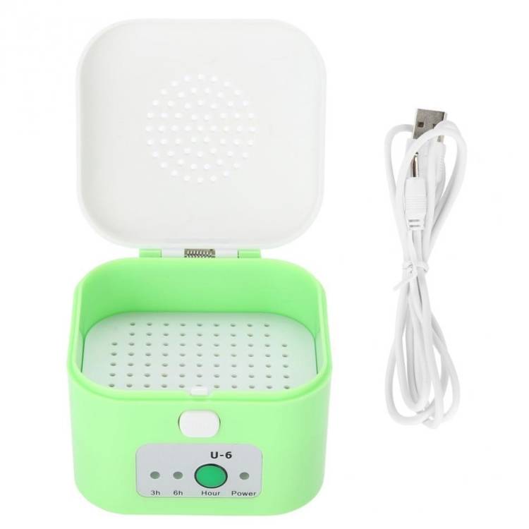 Timed drying box for hearing aids